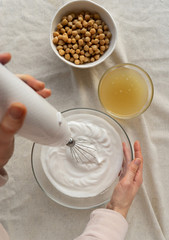 vegan cooking concept, egg replacement , chickpeas whipped aquafaba