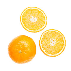 Whole orange and sliced round halves of citrus isolated on white background, top view, flat lay