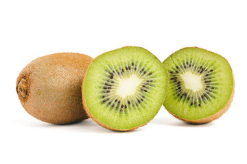Two round slice halves kiwi and whole tropical fruit isolated on white background