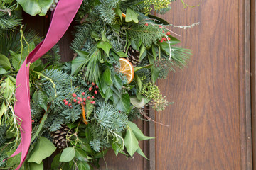 Green Christmas Wreath on Wood