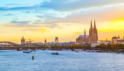 sunset in cologne with Dome and river Rhine