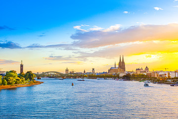 sunset in cologne with Dome and river Rhine - obrazy, fototapety, plakaty