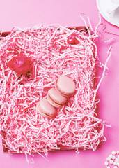 Pink gift box with macaron and heart shape for romantic presents