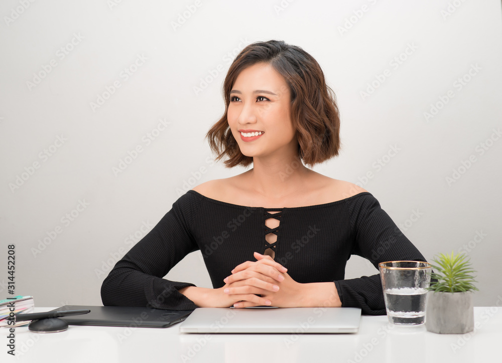 Aufkleber asian attractive photo editor working on computer in a modern office