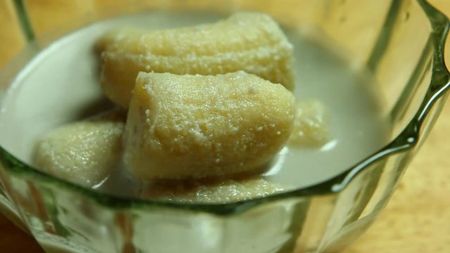 Bananas in coconut milk or Kluy Baud-she , Thai famous dessert