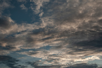 Fototapeta premium Beautiful blue sky with clouds background. The softness of the clouds and the brightness of the sky. Light blue background. Relaxing feeling and inspirational.