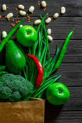 Healthy food clean eating selection: fruit, vegetable, seeds, superfood, cereals, leaf vegetable on...