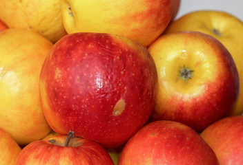 Fototapeta na wymiar A close up of red-yellow apples.