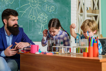 Practical knowledge. Experimenting together. Child care and development. School classes. Kids adorable friends having fun in school. School chemistry lab concept. Supportive environment explore STEM