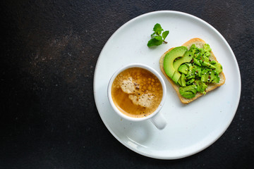 avocado sandwich, healthy food (bread toast snack) menu concept. food background. top view. copy space