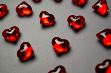 Red hearts on a grey background