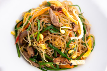 Stir fried Korean glass noodle with soy sauce called Japchae