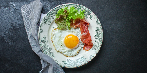 fried eggs, healthy food (delicious snack) menu concept. food background. top view. copy space