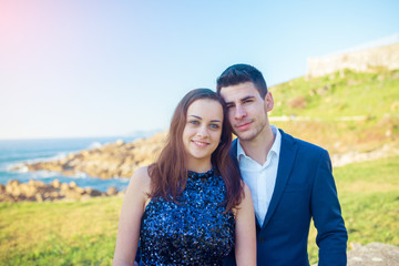 Portrait of a young couple enjoying time together near the sea