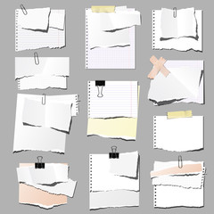 Set of sheets of paper with paper clip and binder clip, isolated.