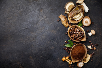 Mushroom Chaga Coffee Superfood Trend-dry and fresh mushrooms and coffee beans on dark background