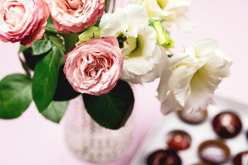 Beautiful Flowers in a Vase Spring Background White and Pink Flowers on Pink Background Copy Space Horizontal Pink Roses and Eustoma Holiday Card