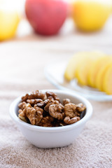 walnuts in a bowl on a table 