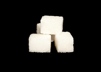 sugar isolated on black background
