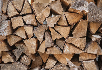 Wooden natural stack of logs background