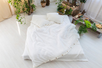natural eco-friendly linen bed in the interior