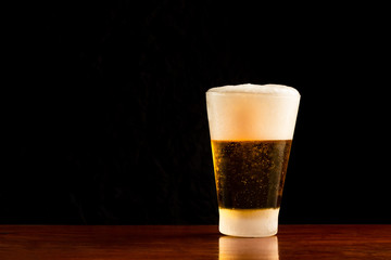 [Beer] mug of beer on dark background, Frosty glass of light beer set.
