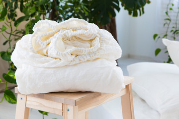 Fototapeta na wymiar natural eco-friendly linen bed in the interior
