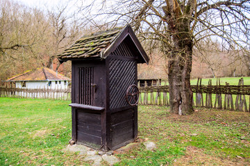 Old wooden traditional water well