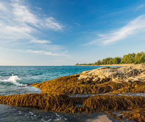 Beautiful seascape with sea and rock in Nang Thong Beach, Khao Lak, Thailand. View of bright blue...