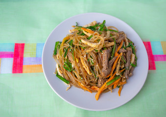 Stir fried Korean glass noodle with soy sauce called Japchae