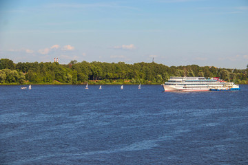 Obraz premium Yachting in Yaroslavl. Competitions in different classes in the area of the left Bank of the Volga.