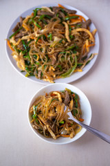 Stir fried Korean glass noodle with soy sauce called Japchae