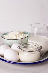 eggs, cottage cheese and milk on a plate top view