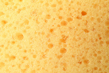 Sponge for washing dishes texture background, macro