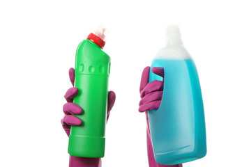 Hands in cleaning gloves hold detergents, isolated on white background