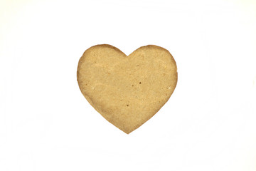 Cardboard heart on a white isolated background. Stock photo for the day of St. Valentine with empty...