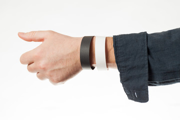 Black and white version of blank bracelet on hand. Paper festival branding wristband, mockup.