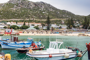 Obraz premium Fishing boats at Kalk Bay harbour - South Africa