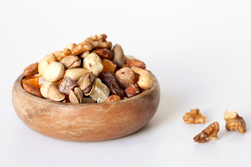 mixed nuts in a wooden bowl