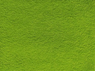 Naklejka na ściany i meble Grass-like texture of a green towel