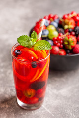 A refreshing drink made from fresh summer berries with lemon and mint.