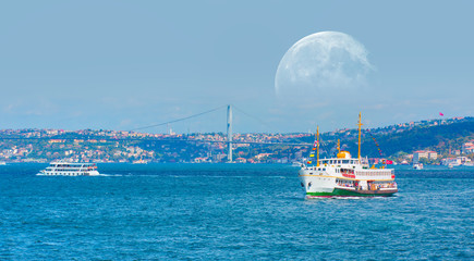 Water trail foaming behind a passenger ferry boat in Bosphorus, Istanbul, Turkey 