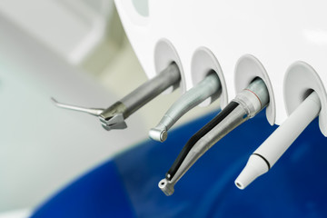 dental handpiece on installation, dental unit for dental treatment,dental tip close up
