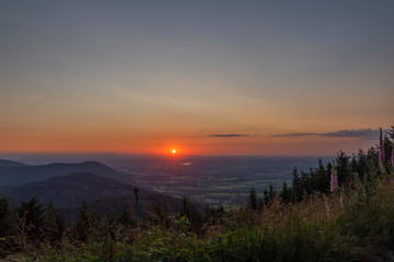 Obraz premium Color summer sunset view from Javorovy hill over Trinec town