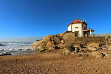 Beautiful chapel in the sea called Senhor da Pedra in Porto
