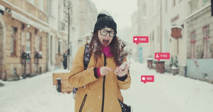 Happy woman got the news. Young woman winning the lottery, success on the stock exchange. On a white snow falling background. Social Media Icons with Like Comment Follower Counter Quick Increase.