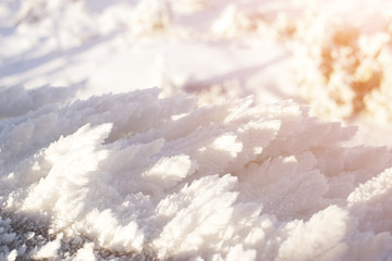 The texture of the snow closeup. Crystals of snow