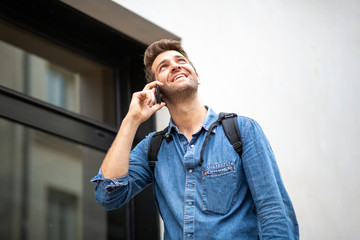 middle age man talking with cellphone outside