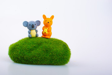 Koala and kangaroo rubber toys, cute animal shaped rubber doll isolated in white background. 