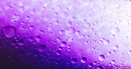 A bubbles is a small column of liquid, bounded completely. Abstract background purple  trend color 2020. Selective focus